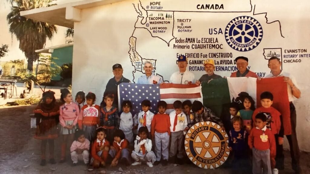 Historic photograph of a Rotary Club San Carlos community project at Escuela Primaria Cuauhtémoc